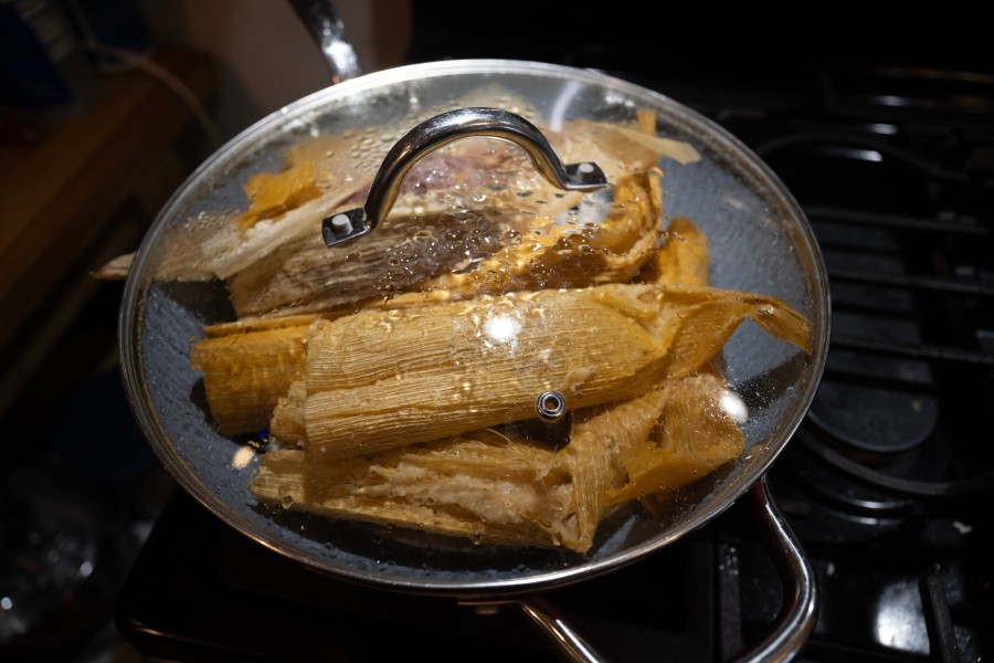 A mixed batch of chicken and pork tamales