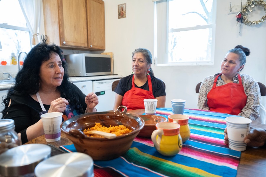 Virginia Hernandez has some tea with her friends