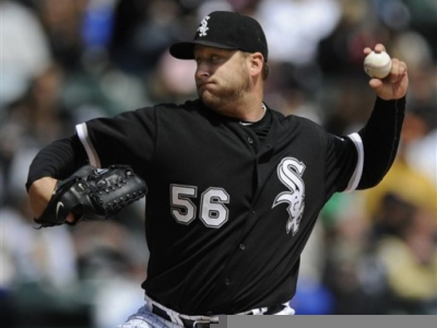 Mark Buehrle follows Ozzie Guillen to Miami, signing $58 million deal with  Marlins - NBC Sports