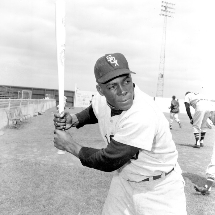 Minnie Minoso of the Chicago White Sox poses before a MLB game at