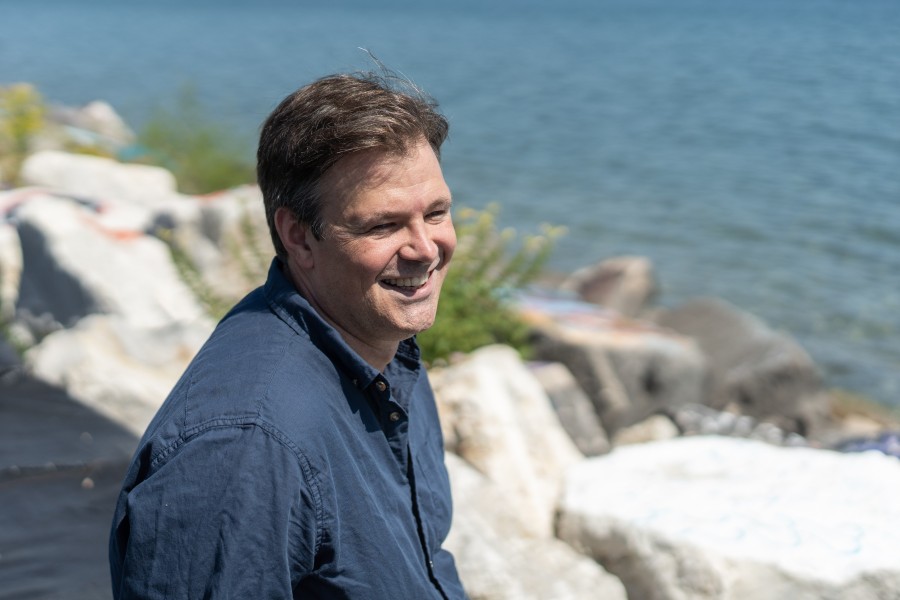 William Dichtel along Lake Michigan: Since childhood, he’s loved swimming and science.