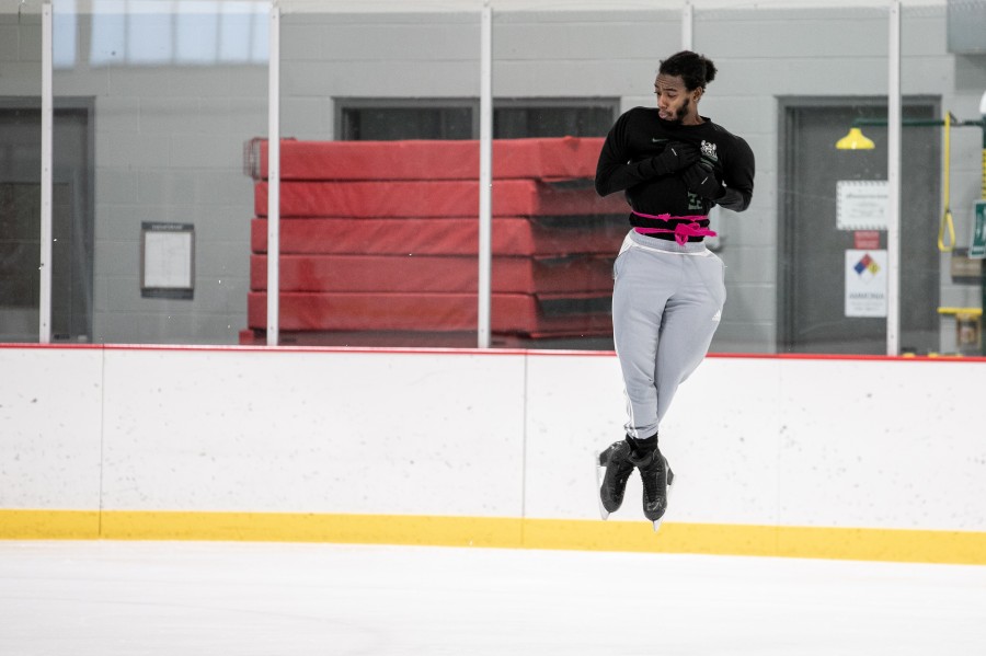 Nathan Chapple mid-jump as he trains at the Glenview Community Ice Center