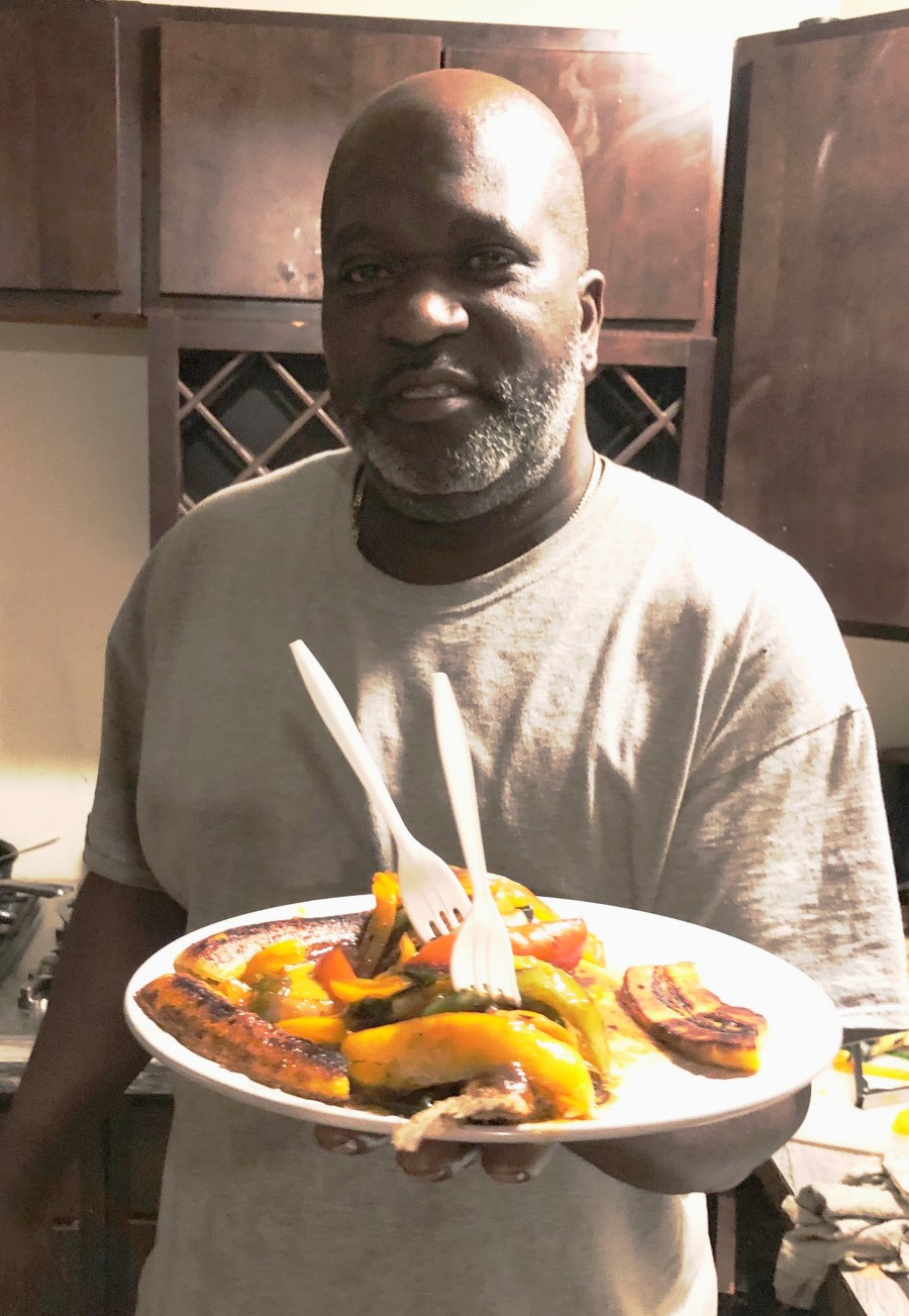 Mark Johnson, also known as Belly, has a Jamaican food business called Belly Up.  He caters in the winter, and in the warmer months he sets up the grill at a local South Side beach.