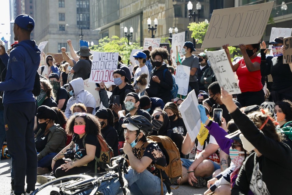 Protests on Saturday, May 30, in Chicago after the death of George Floyd, who was killed after a Minneapolis police officer put his knee on his neck. Public health officials are concerned gatherings could spread COVID-19, but say time will tell. Katherine Nagasawa / WBEZ