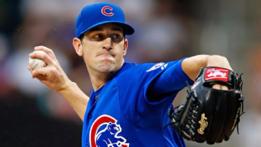 Opening 25-year-old baseball cards with Cubs pitcher Kyle Hendricks