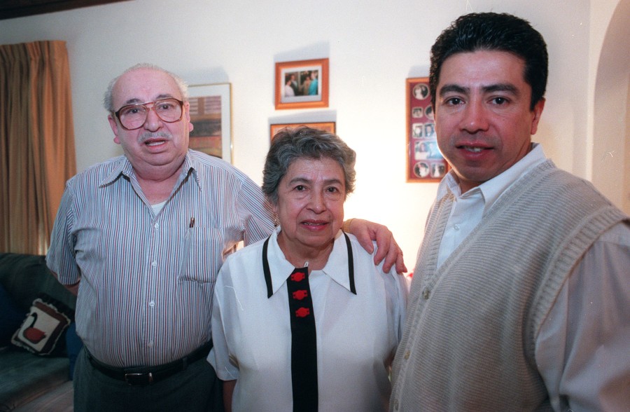Daniel Solis with his parents in 1998.